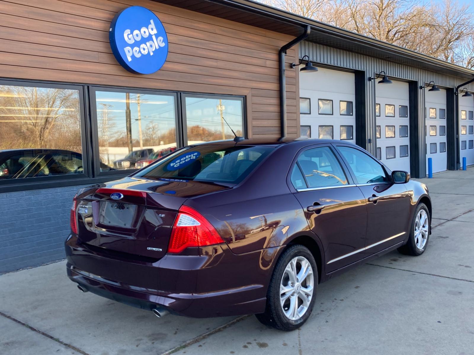 2012 Bordeaux Reserve Met Ford Fusion SE (3FAHP0HG1CR) with an 3.0L V6 DOHC 24V engine, located at 1800 South Ihm Blvd, Freeport, IL, 61032, (815) 232-5543, 42.278645, -89.607994 - Fusion SE 4D Sedan - Photo #1